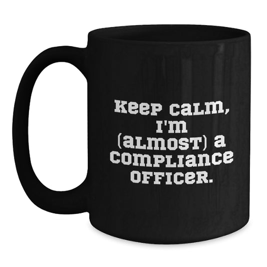 Compliance Officer Gifts for Men - Black Funny Coffee Mug, 'Keep Calm, I'm almost a Compliance Officer' - Birthday Unique Gifts from Friends - Main
