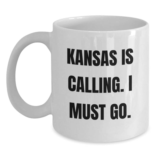 Kansas Gifts, Funny White Coffee Mug, 'Kansas Is Calling. I Must Go.' Quote Gifts for Kansas Lovers - White 11oz or 15oz Ceramic Coffee Mug for Birthday Unique Gifts from Friends to Family - Main