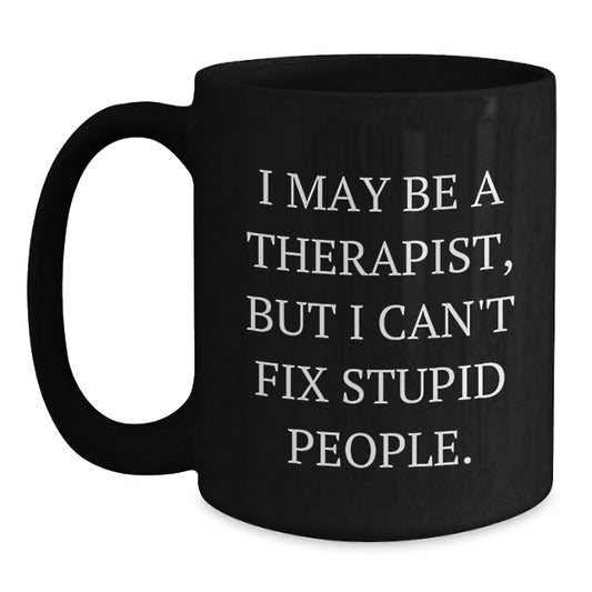 Funny Therapist Gifts from Men for Graduation Unique Gifts - 'I May Be A Therapist, But I Can't Fix Stupid People.' Black Coffee Mug - Main