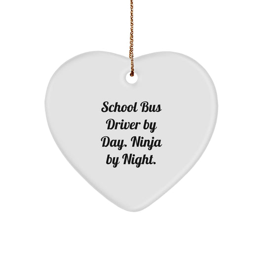 Funny School Bus Driver Christmas Unique Gifts from Men or Women to Friends, Family, or Coworkers - 'School Bus Driver By Day. Ninja By Night.' Heart Ornament - Image 1