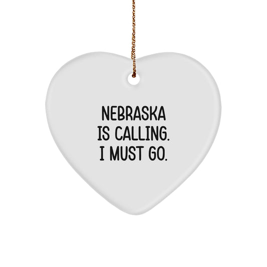 Nebraska Heart Ornament, Funny Quote Nebraska Gifts for Home Decor, Gifts from Friends and Family for Christmas Unique Gifts, 'Nebraska Is Calling. I Must Go.' Heart Shaped Decor - Image 1