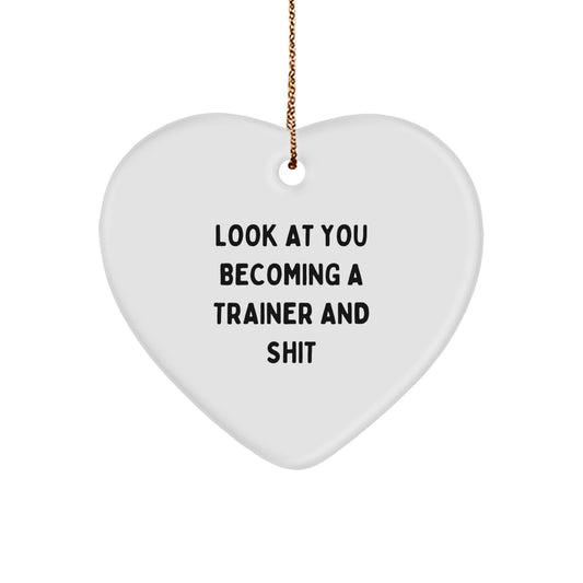 Funny Trainer Gifts from Friends for Christmas Unique Heart Ornament, 'Look At You Becoming A Trainer And Shit' Trainer Inspiration, White Heart Shaped - Image 1