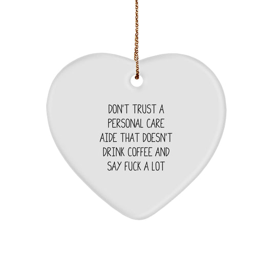 Funny Gift Ideas for Personal Care Aide Friends - 'Don't Trust A Personal Care Aide That Doesn't Drink Coffee' Heart Ornament for Christmas - Image 1