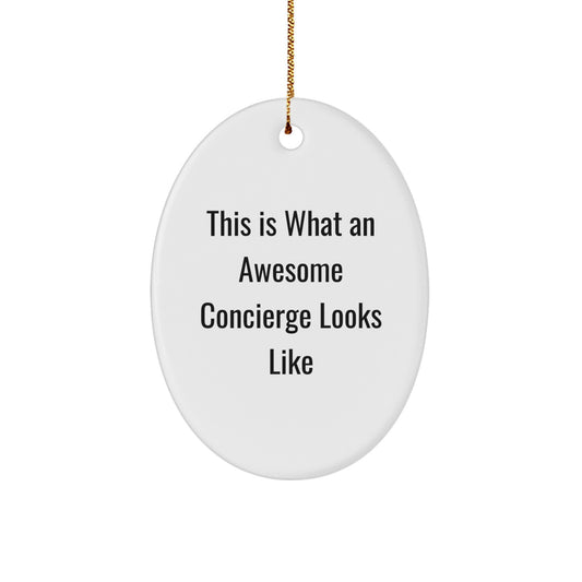 Funny Concierge Gifts from Family, Christmas Unique Gifts for Concierge, Oval Ornament Quote 'This Is What An Awesome Concierge Looks Like' - Image 1