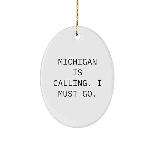 Michigan Oval Ornament Gifts from Friends and Family for Your Loved One - 'Michigan Is Calling. I Must Go.' - White Oval Shaped Christmas Unique Decorations - Image 1