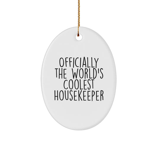 Oval Christmas Ornament for Coworkers Gift – the Coolest Housekeeper - Image 1