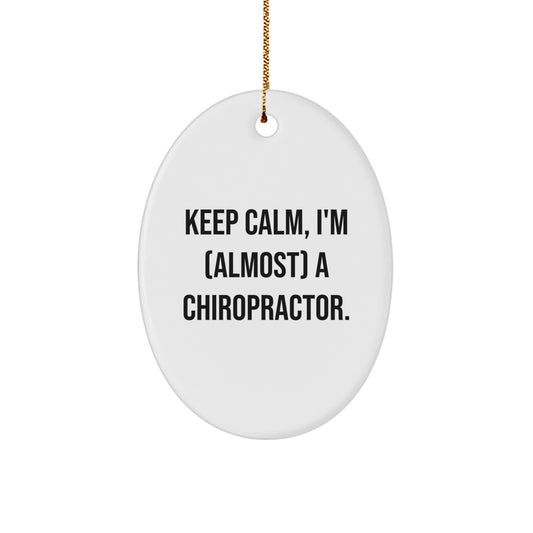 Funny Chiropractor Gifts for Men, Women, Family - Oval Ornament - 'Keep Calm, I'm (almost) A Chiropractor.' - Image 1