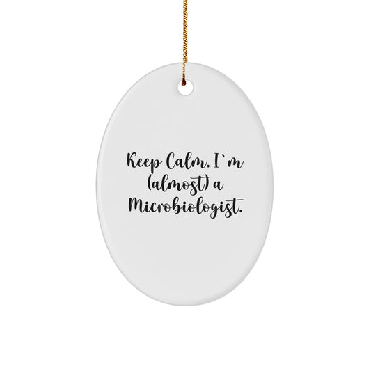 Funny Microbiologist Christmas Unique Gifts, Keep Calm I'm Almost a Microbiologist Oval Ornament, Great Gift Ideas for Microbiologist Friends and Family - Image 1