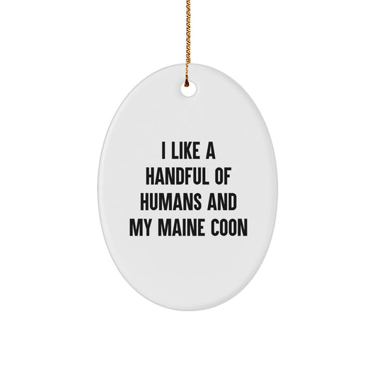 Funny Maine Coon Cat Lover Gifts for Friends from Men, Oval Ornament I Like A Handful Of Humans And My Maine Coon - Image 1