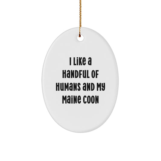 Funny Maine Coon Cat Gifts from Friends for Christmas - Oval Ornament, I Like A Handful Of Humans And My Maine Coon - Image 1