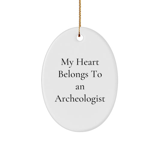 Funny Archeologist Christmas Unique Gifts From Men To Archeologist Friends Oval Ornament, My Heart Belongs To An Archeologist Enthusiast, Archeologist Lover Gift For Christmas Unique - Image 1
