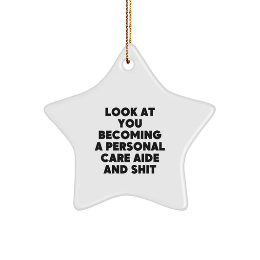 Gifts from Friends for Personal Care Aide Unique Christmas Star Ornament, 'Look At You Becoming A Personal Care Aide And Shit', White Star Shaped Decoration - Image 1